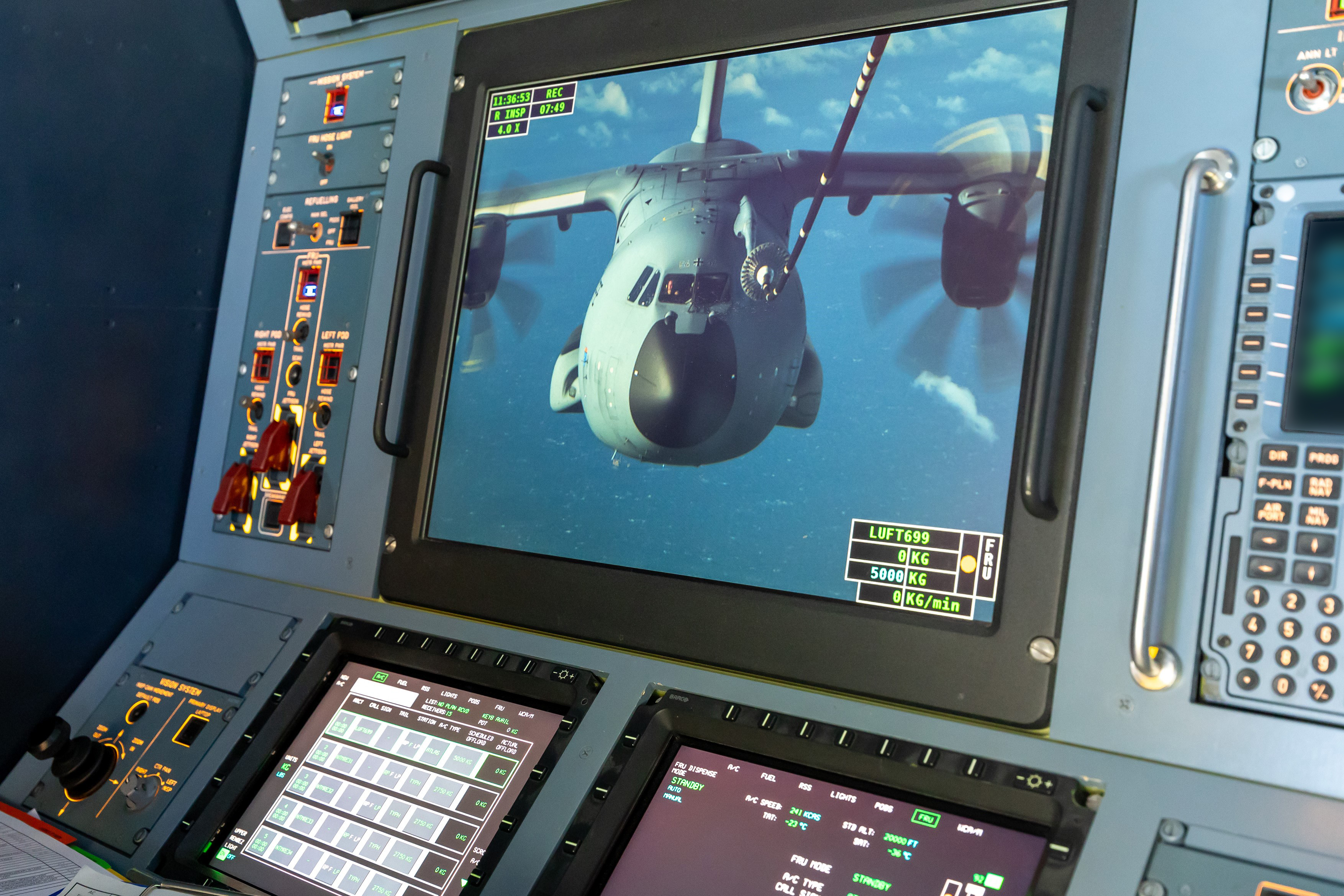 Photo - RAF Voyager AAR Station and Operating aircrew, German A400M shown in video monitor receiving fuel.